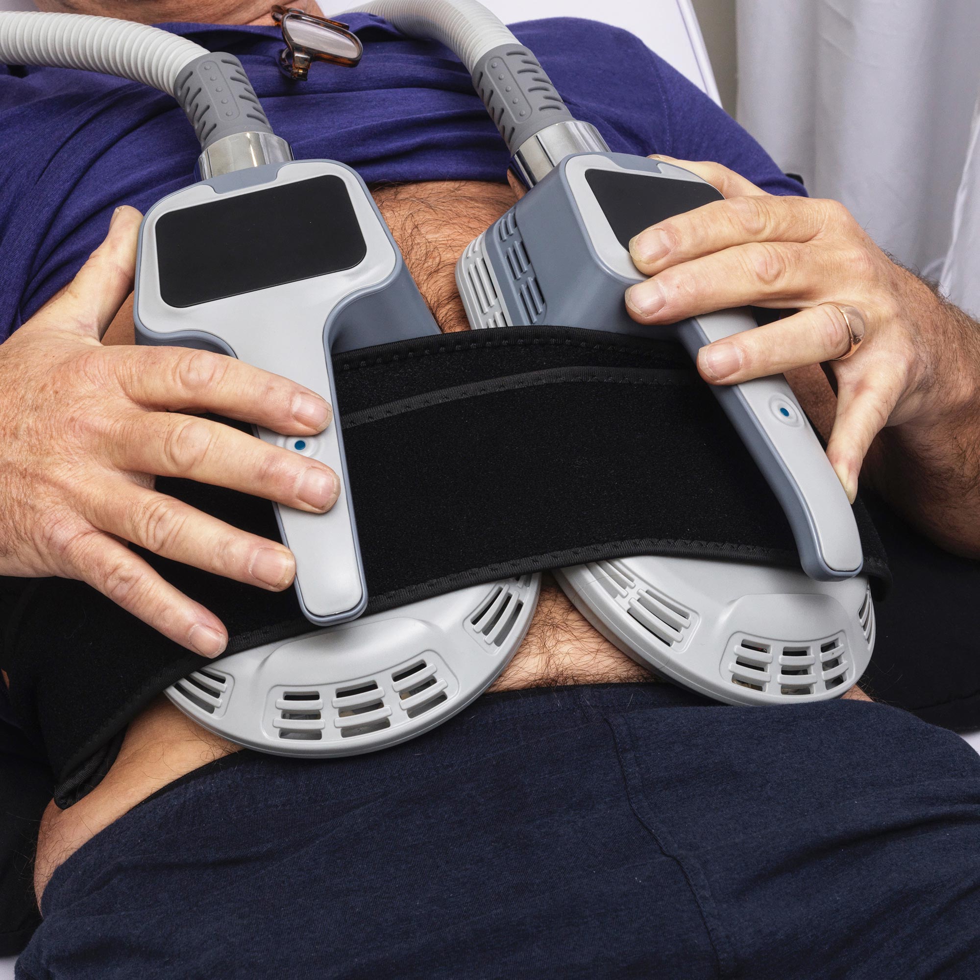 Man using a Musculpting machine