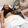 Woman getting cavitation and cellulite removal