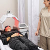 Woman having red light therapy for redness